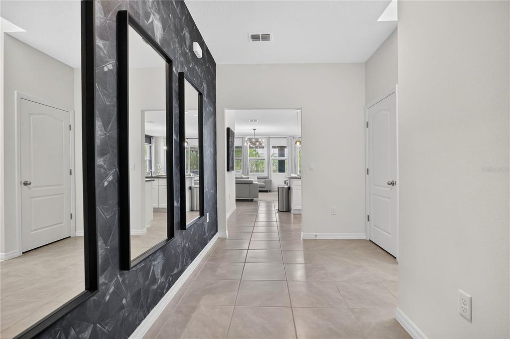 Photo of 7699 Oakmoss Loop, Davenport, FL 33837 (MLS # O6384522)