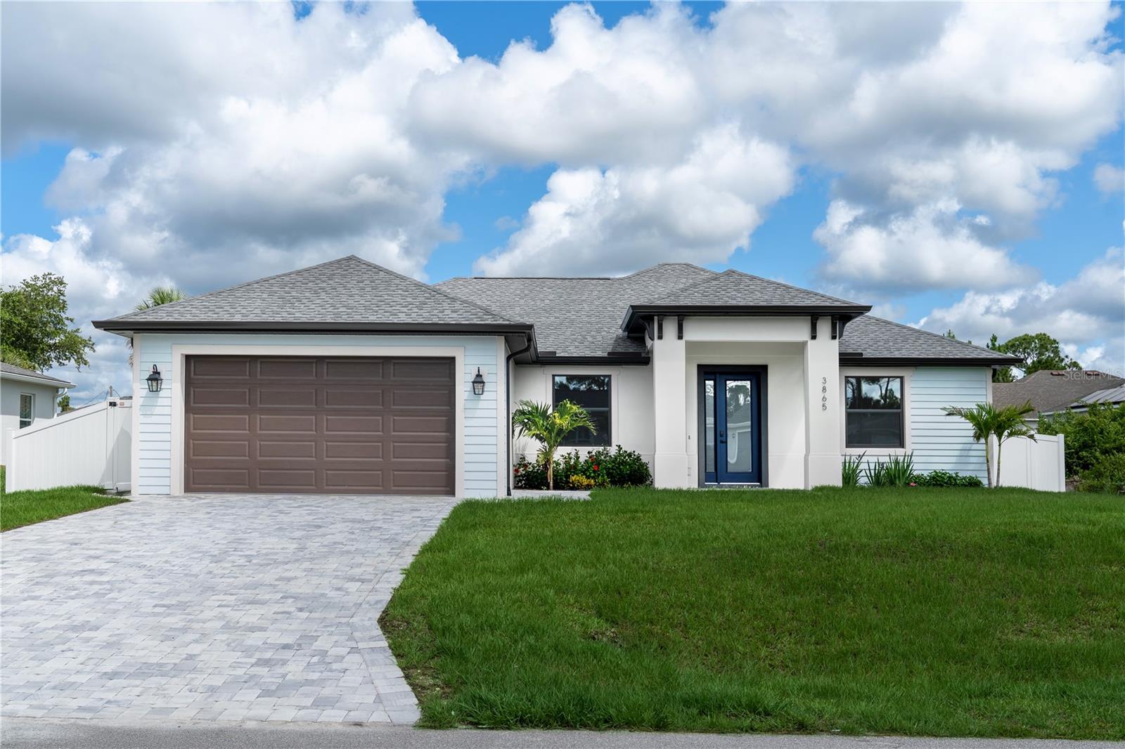 Move-in Ready New Construction Home with Custom finishes is waiting for you. Welcome to this beautifully crafted 3
Bedroom + DEN/OFFICE, 2 full bathrooms home where no detail was overlooked in designing and finishing this home.
The modern home features a bright open concept floor plan that’s perfect for entertaining family and friends. The spacious den offers flexibility and can easily used as a 4th bedroom, making it ideal for any lifestyle. PORCELAIN TILE THROUGHOUT
the entire house provides a seamless and luxurious feel that everyone desires. Cooking will be a dream in the gourmet chef’s kitchen
with OVERSIZED QUARTZ ISLAND and countertops, UPGRADED PREMIUM STAINLESS STEEL APPLIANCES, 42” SOLID
WOOD SHAKER CABINETRY, BACKSPLASH, and a Walk-in pantry. The large Owner's Suite bed is a true sanctuary if filled with
natural light and a has a Private Slider to lanai. The Breathtaking En-Suite bath has a designers touch with
large format tile in the shower, SOAKING TUB, QUARTZ COUNTERTOPS with DUAL SINKS are highlighted with LED
MIRRORS and tiled backsplash. This Energy efficient home has HEAVY DUTY HURRICANE IMPACT WINDOWS AND
SLIDERS and DOOR, UPGRADED 4" LED RECESSED LIGHTING with MODERN DESIGNER LED lighting fixtures and ceiling
fans throughout. VINYL PRIVACY FENCE AROUND THE BACKYARD, EURO STYLE PAVERS IN Driveway and Lanai, Irrigation system is included in both front and back lawns, and Epoxy floors in the garage. The homeowner will have peace of mind with a 1 year
builder warranty. Located in a Prime area of the growing city of North Port, close to shopping and dining, and just a short
drive to Florida's stunning sandy beaches! NO HOA, NO CDD Restrictions, so take the next steps in fulfilling the
dream of owning this home.
