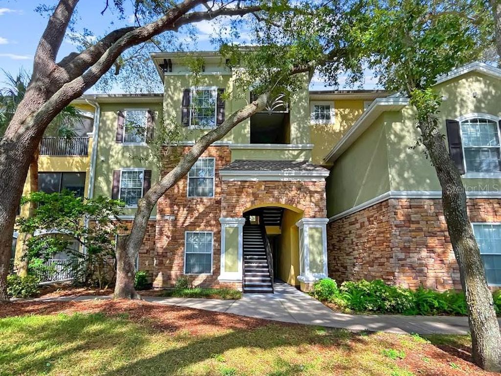 Photo of 10105 Courtney Palms Boulevard #303, Tampa, FL 33619 (MLS # TB8434757)