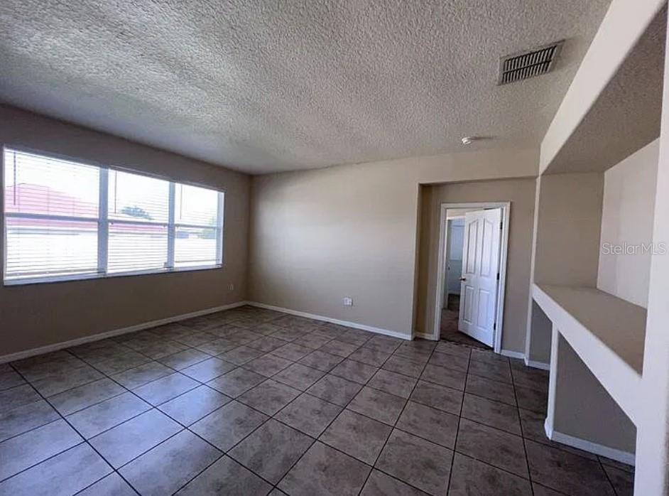 Photo of 247 Canna Drive, Davenport, FL 33897 (MLS # S5159782)