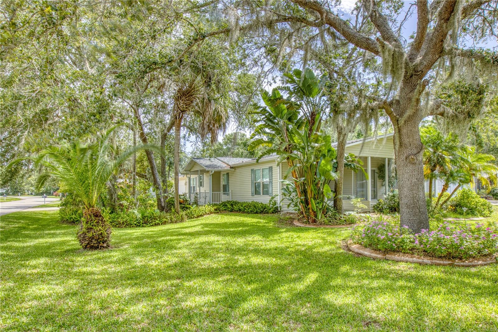 Attention BOAT and WATER LOVERS looking for somewhere to live that gives you DIRECT ACCESS to INTRACOASTAL boating and fishing in the INDIAN RIVER LAGOON. This well cared for 3 bedroom, 2 bathroom home was built in 2007 and is located in the Lighthouse Cove Development offering GATED entrance, community POOL, CLUBHOUSE, FITNESS room, PICKLEBALL courts, SHUFFLEBOARDS courts, BOAT RAMP, FISHING pier/dock, and boat STORAGE. The home has updated A/C in 2025, ROOF in 2018 and sits on a large CORNER LOT. Experience an airy OPEN CONCEPT living space where the kitchen, dining, and living areas flow seamlessly, ideal for entertaining. Other features include a 3rd bedroom that could be used as a den and offers sliding glass doors taking you out to the SCREEN PORCH overlooking a landscaped lot with mature trees. Parking is not an issue with the DOUBLE CAR garage and 2 CAR driveway slab. Need additional storage or enjoy working outside, a 10x10 storage room is attached to the garage with an additional entry door to outside. This neighborhood has lots of community activities along with paved streets that are perfect for taking walks or bike rides. If you don't want to walk, hop on your golf cart and drive to the clubhouse or dock and enjoy the evening breezes coming off of the intracoastal.