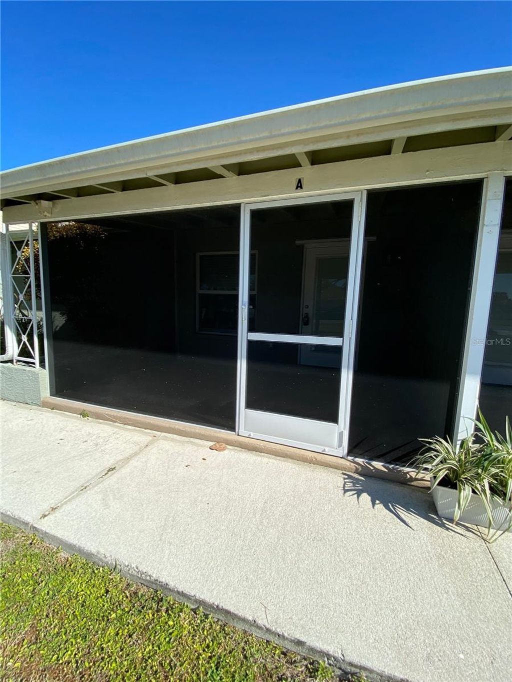 Photo of 394 N Spring Lake Boulevard NW #A, Port Charlotte, FL 33952 (MLS # D6143431)