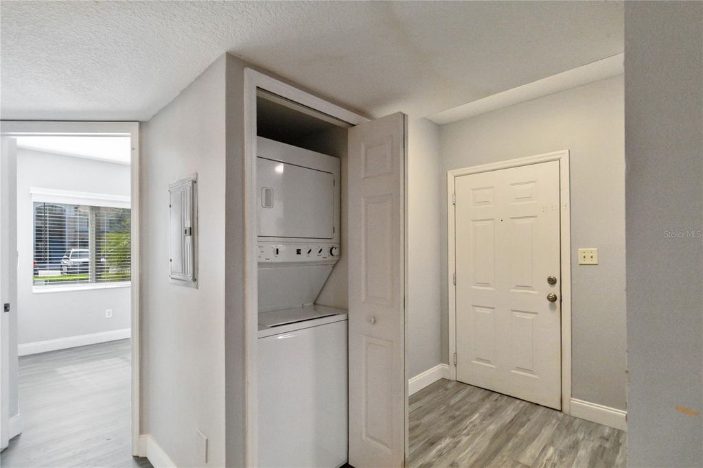 Photo of 521 Villa Del Sol Circle #102, Orlando, FL 32824 (MLS # O6389229)