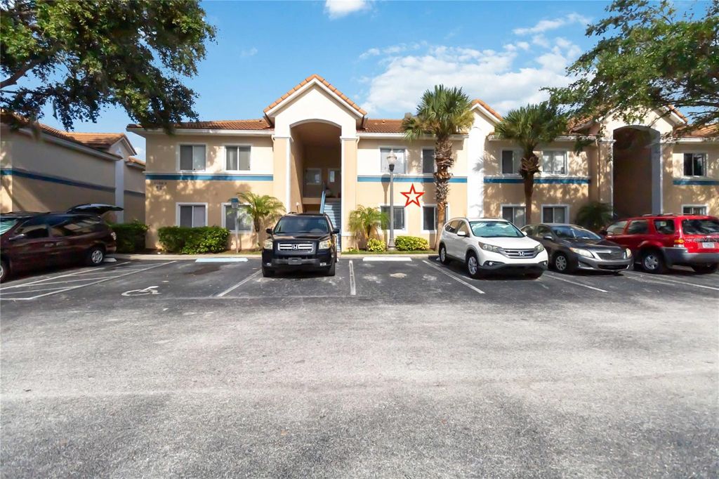 Photo of 521 Villa Del Sol Circle #102, Orlando, FL 32824 (MLS # O6389229)