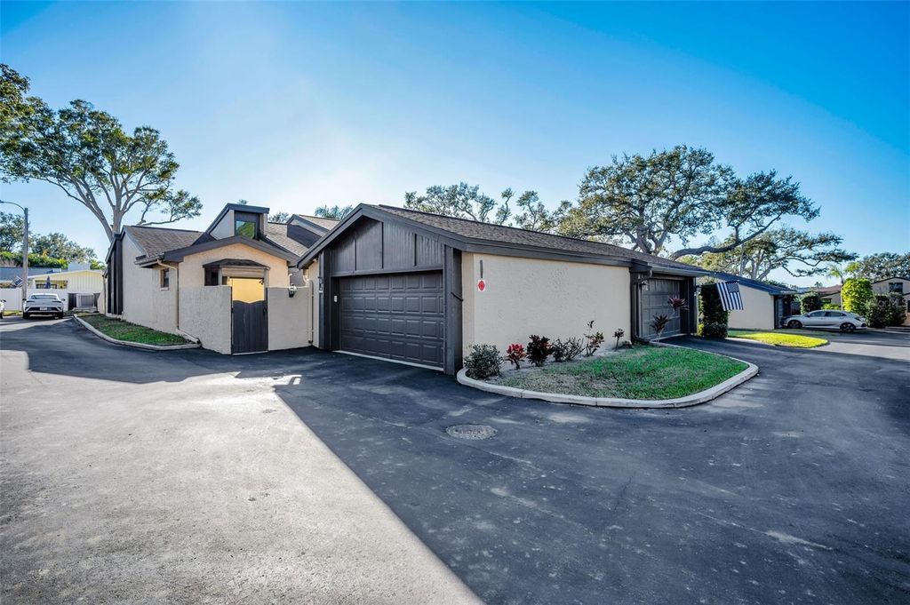 Photo of 13300 Indian Rocks Road #101, Largo, FL 33774 (MLS # TB8468292)