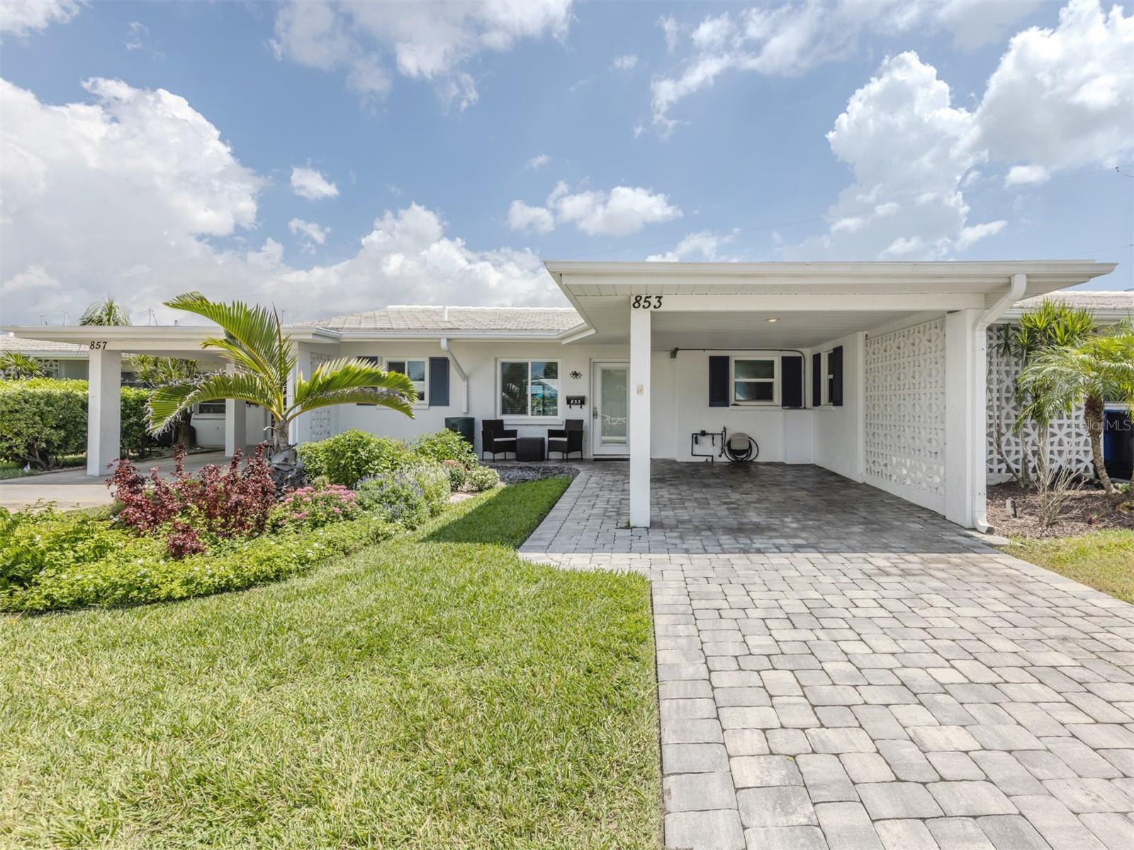 Step inside this completely remodeled Venice Island villa and enjoy light, airy living with thoughtful upgrades throughout. The kitchen shines with shaker-style cabinetry, sleek quartz countertops, and stainless steel appliances, all designed with both function and style in mind. Neutral tile flooring flows seamlessly through the home, creating a clean, coastal look that’s easy to maintain.
The living and dining space opens through sliding glass doors to a waterfront patio, where you can relax under the electric pergola while enjoying tranquil canal views and the community pool is right across the street. Inside and out, this villa is designed for easy entertaining and everyday comfort.
For boating enthusiasts, this property is a rare find—where else can you park your 35+ foot boat right outside your door in the deep water canal with Gulf to bay access with no bridges! With your own dock slip, direct canal access, and close proximity to the Intracoastal and Gulf, it’s a dream come true for water lovers.
Living here means you’re minutes from some of Venice’s best attractions. Boat over to waterfront restaurants along the Intracoastal, or drop anchor for a beach day at Snake Island or nearby sandbars. On land, enjoy the charm of historic downtown Venice with its boutique shops, dining, and cultural events. Venice Beach and the South Jetty are just a short ride away for sunset walks, dolphin watching, or fishing.
Whether as a full-time residence, vacation getaway, or investment, this remodeled villa offers an unbeatable lifestyle on Venice Island.