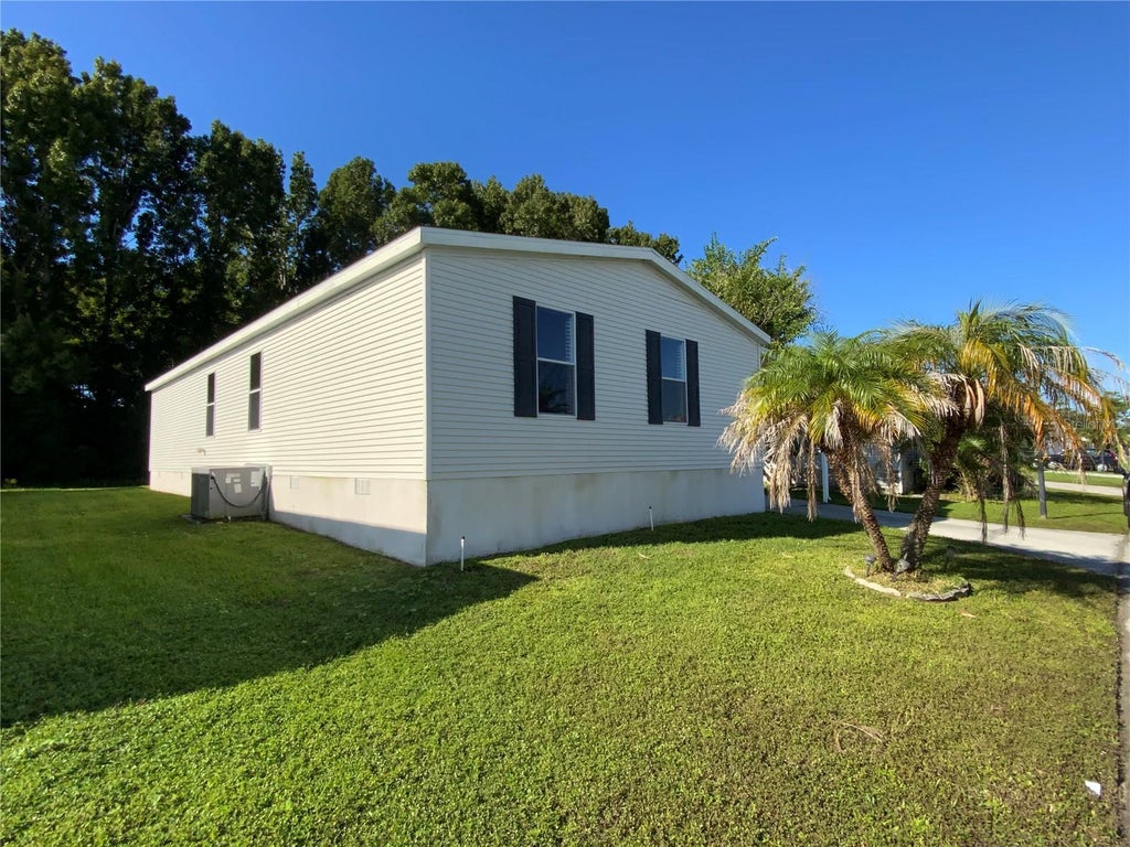 Photo of 7832 Walkers Cay Avenue, Orlando, FL 32822 (MLS # O6443357)