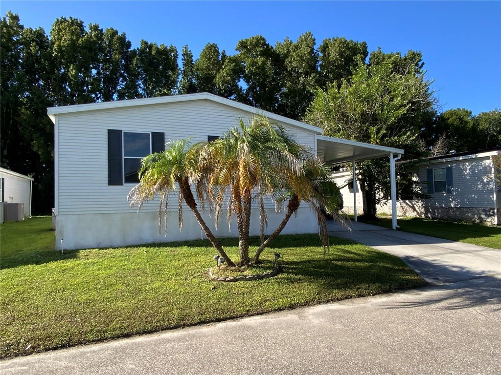 Photo of 7832 Walkers Cay Avenue, Orlando, FL 32822 (MLS # O6443357)