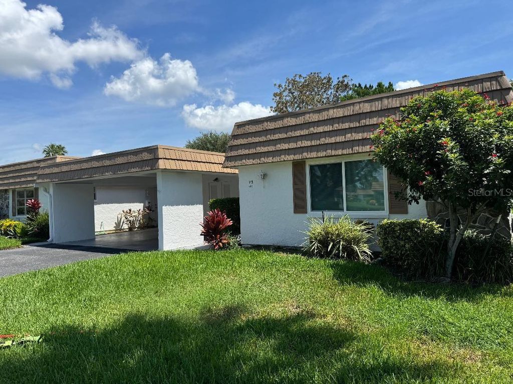 Photo of 5531 Riverbluff Circle #V9, Sarasota, FL 34231 (MLS # A4662244)
