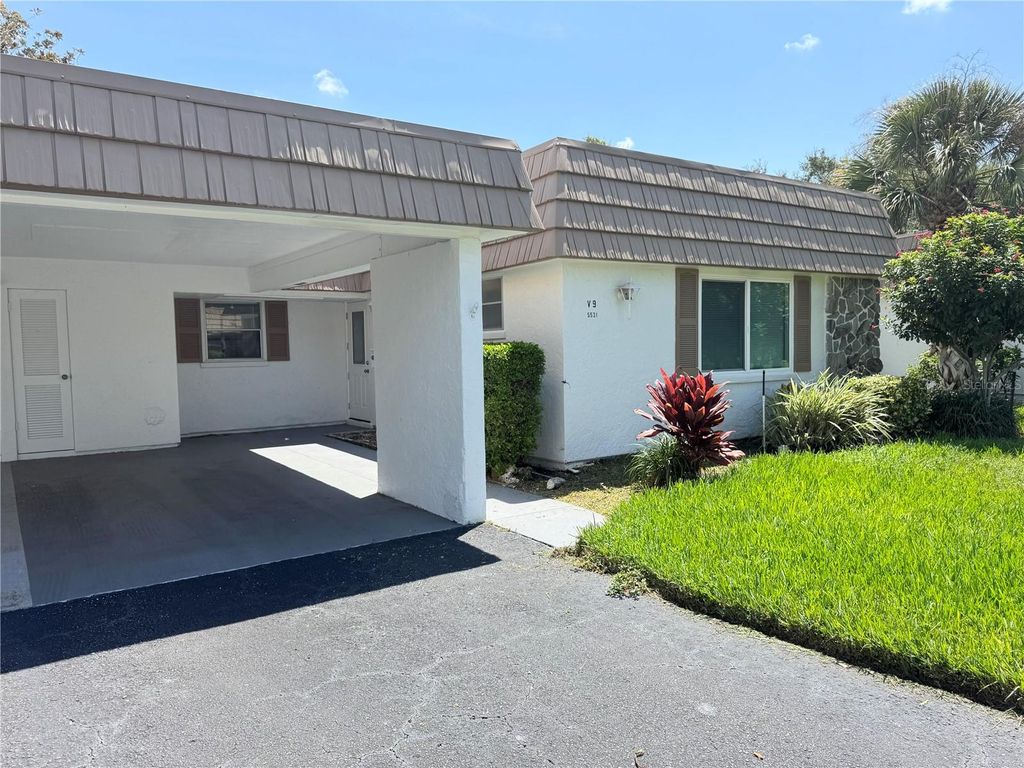Photo of 5531 Riverbluff Circle #V9, Sarasota, FL 34231 (MLS # A4662244)