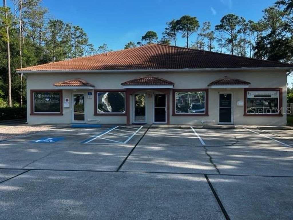 Photo of 21 Utility Drive #A, Palm Coast, FL 32137 (MLS # FC315897)
