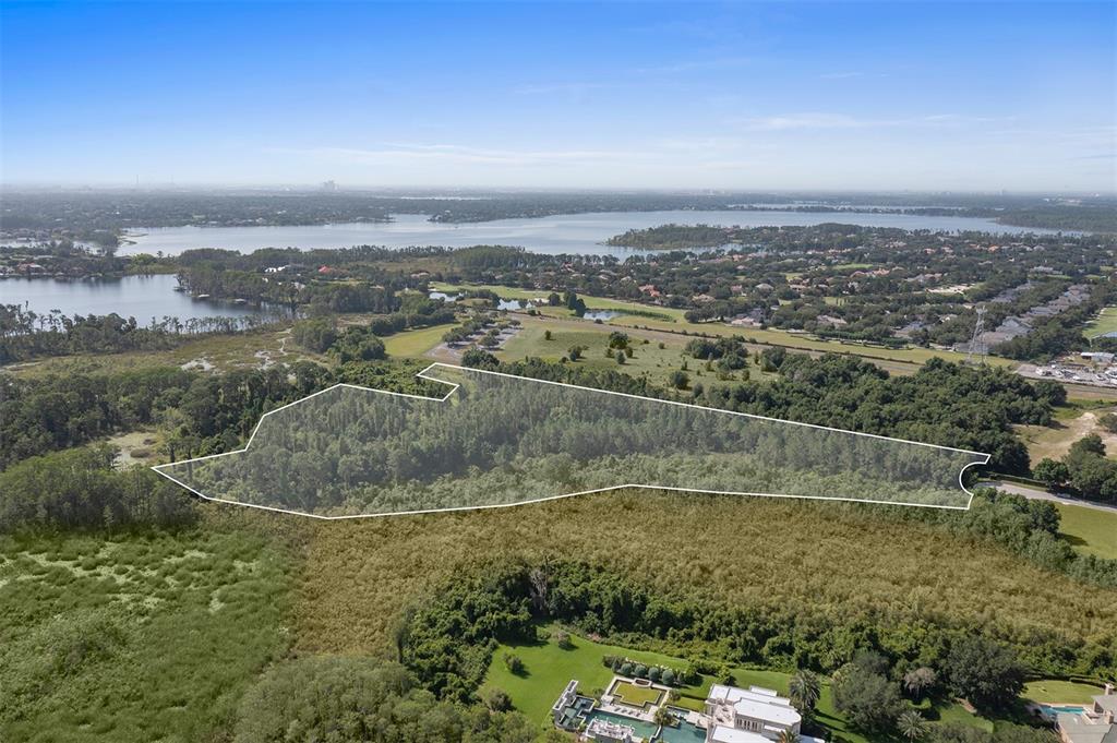 Available for the first time, this extraordinary property on a cul-de-sac in the secluded Isleworth West offers an alluring setting with plenty of privacy and views of the surrounding nature preserve. One of the largest of Isleworth’s home sites at more than 14 acres, the expansive site features a buildable area of 5.69 acres and presents rare opportunity to build a grand, custom estate from a select list of Central Florida’s leading custom home builders. This lot also presents an opportunity for development.