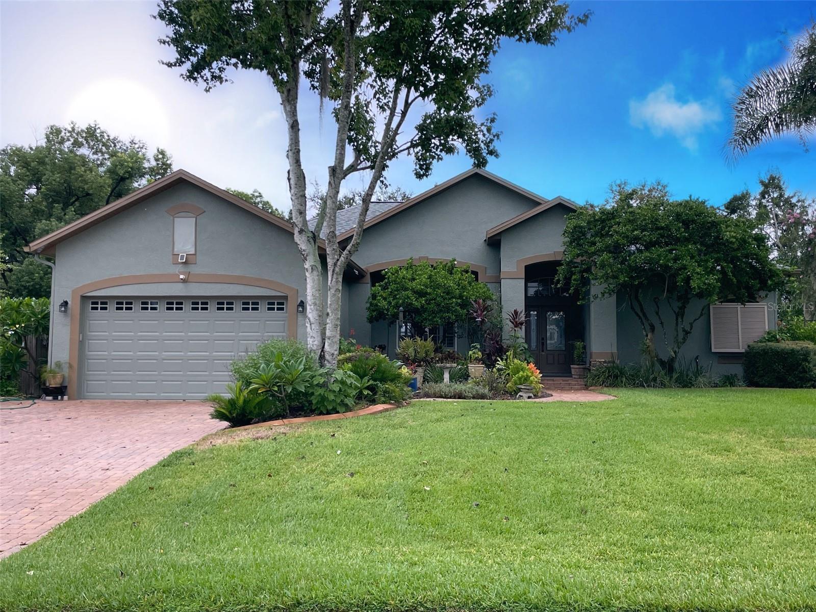 Impeccably maintained home with beautifully landscaped 1/2 ACRE lot in the heart of San Antonio. Home offers spacious living areas with living and family rooms, custom shutters on windows, gleaming wood floors, propane GENERATOR and fireplace, newer ROOF, nicely UPDATED master bath, brick paver driveway and screen enclosed SALT-WATER POOL with serene views of the large fenced backyard. You're going to love it. Come see for yourself, call today and let's make this your new home.