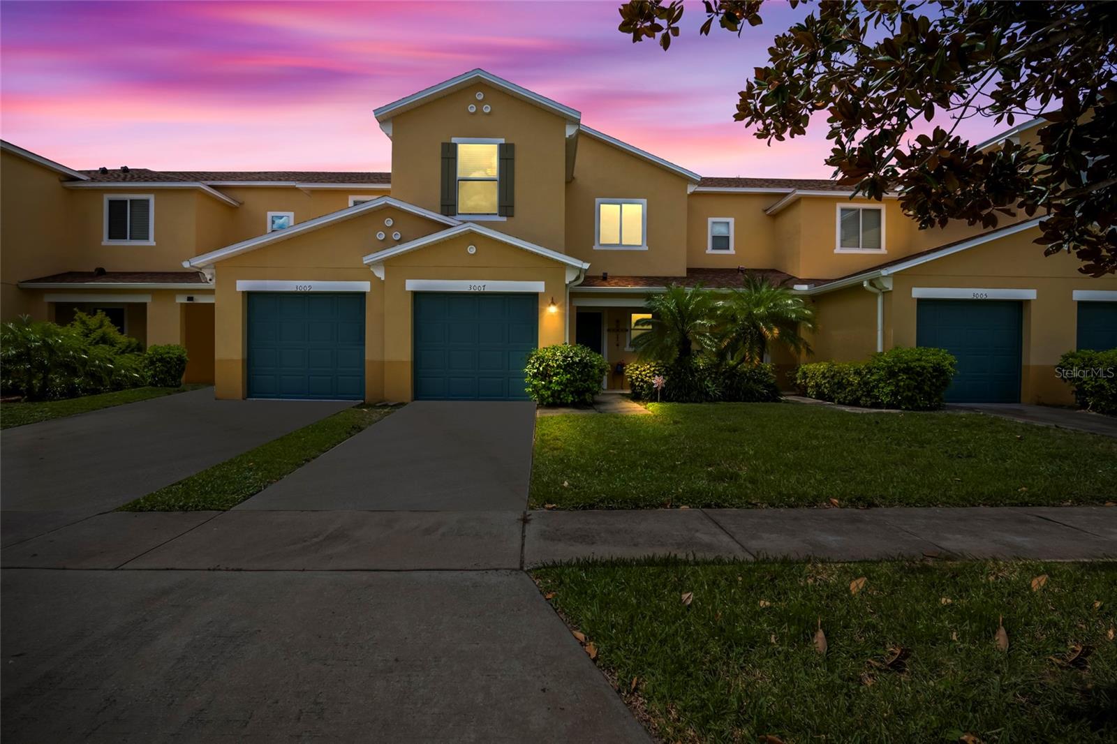 Step into this nearly new, barely lived-in 3-bedroom, 2.5-bath townhome in a secure gated community with very low HOA fees. Featuring a brand-new roof, brand-new AC, and included refrigerator, washer, and dryer, this residence offers true move-in readiness. The open floor plan creates a bright, flowing living space ideal for both everyday living and entertaining. Located minutes from world-class theme parks, shopping, and dining, this home delivers both comfort and convenience in one of Central Florida’s most desirable locations. Immaculately maintained, it combines modern upgrades with a pristine condition that feels like new construction—without the wait. Please take off your shoes if visiting as the home has not had shoes present inside.