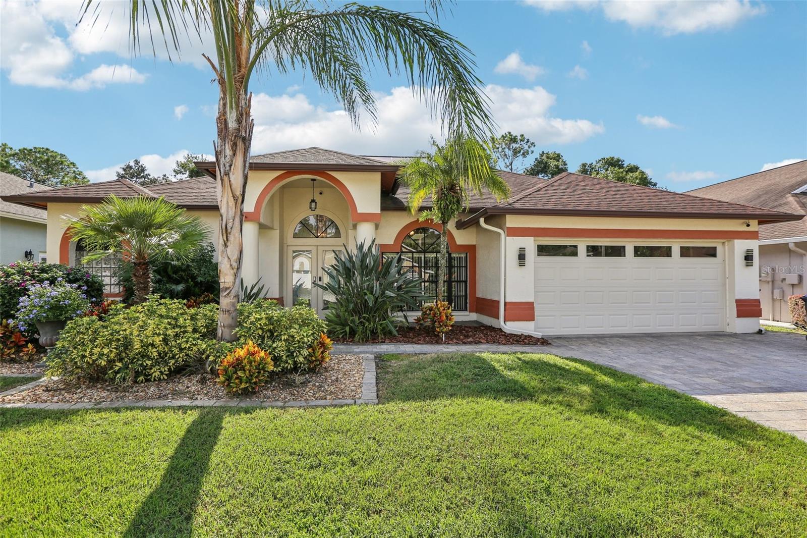One or more photo(s) has been virtually staged. Your search is over! This meticulously maintained 3-bedroom, 2-bathroom home, complete with a private office, offers everything on your wish list and more. Located on a peaceful CUL-DE-SAC in New Tampa's desirable Pebble Creek, this property combines stunning design with unmatched financial benefits, including NO CDD AND A LOW HOA FEE. This home is as efficient as it is beautiful. The FULLY PAID-OFF SOLAR PANELS HAVE SLASHED THE MONTHLY ELECTRIC BILL TO AN AVERAGE OF JUST $20 PER MONTH! Combined with the LOWER TAXES OF UNINCORPORATED HILLSBOROUGH COUNTY, the savings are substantial.
From the moment you approach, the impressive curb appeal—showcasing LUSH LANDSCAPING AND A PAVERED DRIVEWAY—hints at the quality within. The heart of this home is the OPEN-CONCEPT LIVING SPACE, where an UPDATED KITCHEN shines with gleaming QUARTZ COUNTERTOPS, SOLID WOOD CABINETRY, STAINLESS STEEL APPLIANCES, and a spacious BREAKFAST BAR OVERLOOKING THE FAMILY ROOM. Enjoy breakfast in the light-filled dinette, framed by an oversized plate glass window with serene lanai views.
When you're ready to embrace the Florida lifestyle, FULLY RETRACTABLE TRIPLE SLIDERS disappear, creating a seamless flow to your private outdoor oasis. The EXPANSIVE SCREENED LANAI features a FULL OUTDOOR KITCHEN and a sparkling, SOLAR-HEATED POOL with a NEW CUSTOM-FINISH DECK. Beyond the enclosure, the backyard offers ultimate privacy with NO REAR NEIGHBORS and a charming GAZEBO COMPLETE WITH ELECTRICITY AND A FIRE PIT—perfect for year-round enjoyment.
This home is designed for modern living. Work from home in the DEDICATED OFFICE FEATURING CUSTOM BUILT INS. The interior is unified by beautiful LAMINATE AND TILE FLOORING THROUGHOUT (NO CARPET!) and accented with elegant 5 ¼ baseboards. The primary bedroom is a true retreat, boasting a CUSTOM WALK-IN CLOSET and a spa-like en suite bathroom with DUAL VANITIES, A DEEP GARDEN TUB, AND A SEPARATE WALK-IN SHOWER.
Recent upgrades, including a NEW GARAGE DOOR and EXTRA ATTIC INSULATION, add to the home's value and efficiency. The WASHER AND DRYER ARE INCLUDED, making your move even easier.
Enjoy the community AMENITIES including the CLUBHOUSE WITH POOL, TENNIS AND PICKLEBALL COURTS, FITNESS CENTER AND SAND VOLLEYBALL COURT. Pebble Creek is situated in a prime New Tampa location, you are just minutes from I-75, I-275, Wiregrass, Tampa Premium Outlets, USF, Moffitt Cancer Center, and the VA Hospital. This isn't just a home; it's a lifestyle upgrade. Contact us today to schedule your private tour!