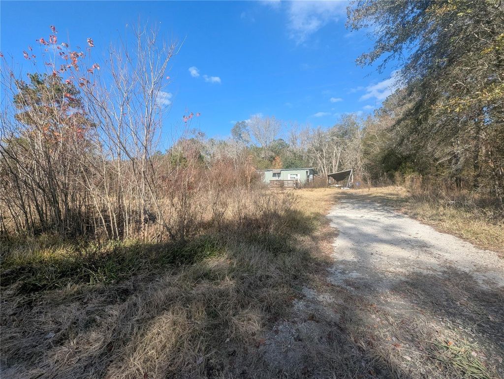 Photo of 4814 NW 244th Avenue, Alachua, FL 32615 (MLS # GC536198)