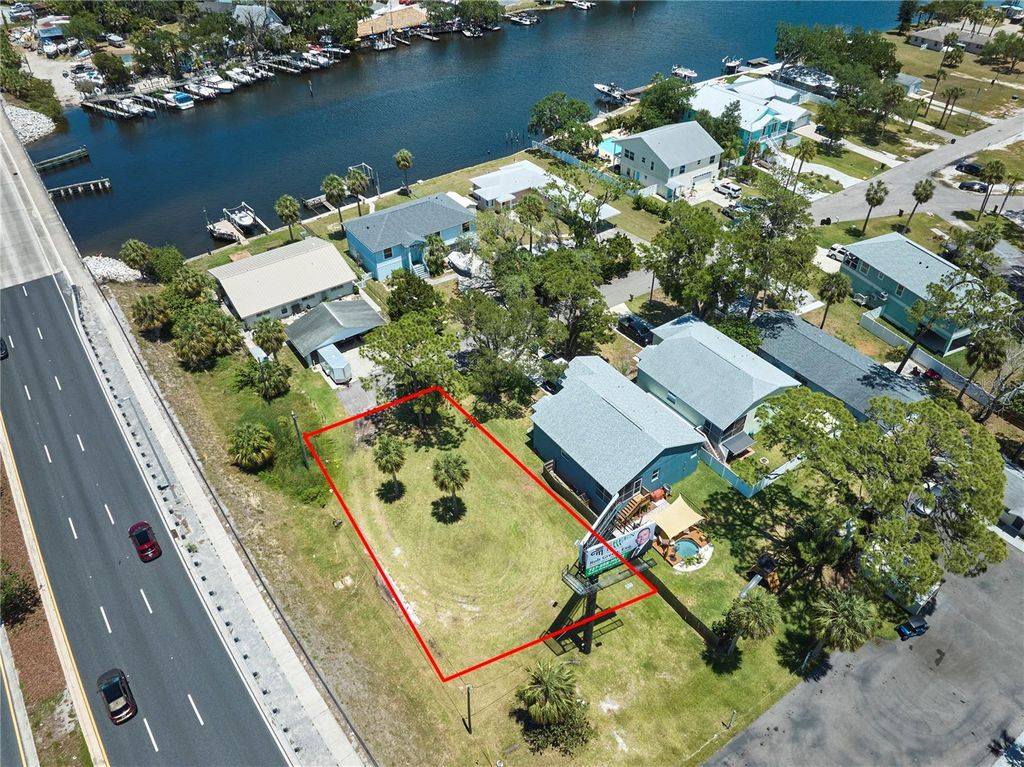 Photo of 0 Cotee River Drive, New Port Richey, FL 34652 (MLS # TB8511665)