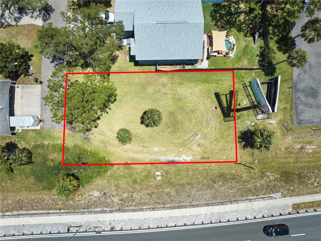Photo of 0 Cotee River Drive, New Port Richey, FL 34652 (MLS # TB8511665)