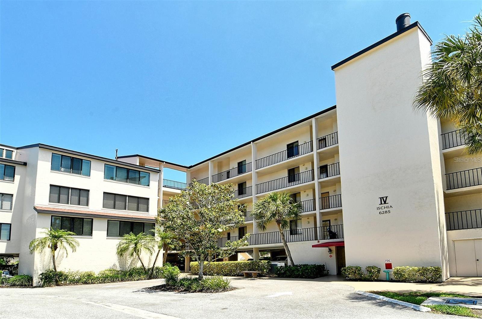 MAJOR PRICE REDUCTION!! Welcome to the only 4th floor/Penthouse condo for sale at the Excelsior Bayside Complex. Coveted for its soaring ceilings and the opportunity to add an upper 3rd bedroom, years can pass without one becoming available, This particular unit faces south and is filled with natural light throughout the year. New AC and water heater in 2025. A pre-listing home inspection was conducted for your peace of mind and is available for review. There have been some upgrades over the years and the condo has been owned by the same family since construction. There have never been any smokers nor has it ever been rented. The screened in lanai overlooks the grounds and has a bird's eye view of the bay. Each condo comes with assigned underbuilding parking and locked storage for your toys and seasonals. Absolutely the best value and opportunity on the market
The Excelsior is amenity rich, including: Two Large Heated Swimming Pools, Poolside Restrooms / Hot Water Showers, Shuffleboard, Two Heated Hot tubs, Two Lighted Tennis Courts, Two Pickle Ball Courts, Fitness Center, Gulfside Sun Deck, Beach Lounge Chairs, Outdoor Grills,, Intercoastal Fishing Pier, Community Room and monthly community events, Library, and catering kitchen. Walk to Shopping, Dining, Bike & Boat Rentals
This ideal location on the key has direct and deeded beach access to Siesta Beach, renowned for its quartz sand which stays cool in the summer and is always smooth underfoot. Easy on and off the key access at the south Stickney Point Bridge. The increasingly popular Gulf Gate neighborhood is just over the bridge offering a wide variety of eclectic restaurants, grocers, pubs, and shops.
A remarkable opportunity with these features and at this price which doesn't come around very often. Priced lower than any other unit as seller is moving to Naples and looking for quick sale.
Please note that many of the grounds photos were taken prior to last year's storms. Landscaping restoration is still in process.