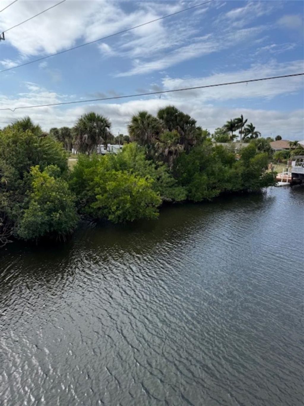 Photo of 18790 Macgill Avenue, Port Charlotte, FL 33948 (MLS # A4680219)