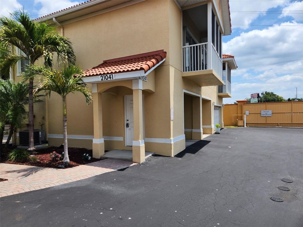 Photo of 21041 Sunpoint Way #202, Lutz, FL 33558 (MLS # W7875159)