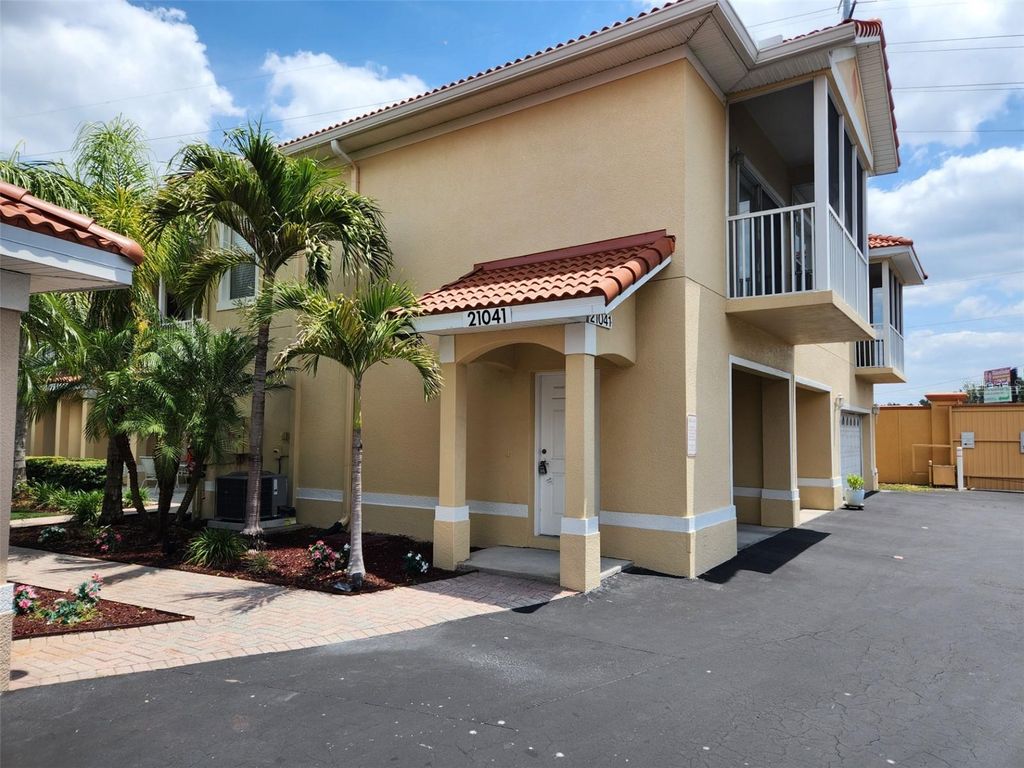 Photo of 21041 Sunpoint Way #202, Lutz, FL 33558 (MLS # W7875159)