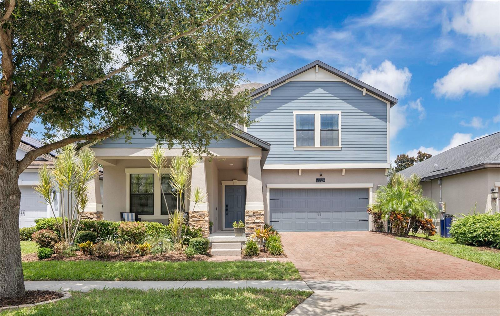 Welcome to one of Summerlake’s most popular & sought-after floor plans, a spacious 5 bedroom, 3 bath, 3-car garage home offering both functionality and comfort, along with nightly views of Disney’s fireworks. This home has been thoughtfully updated inside and out, with new luxury vinyl plank flooring and carpeting installed within the past year and the interior and exterior completely repainted. Custom touches throughout set this property apart, including a built-in pantry, custom shelving in the laundry room, and an upgraded primary closet with motion-sensor lighting. Even the tile grout has been freshly cleaned and sealed.
The open-concept first floor features tile flooring throughout and a modern gourmet kitchen complete with granite countertops, stainless steel appliances, a stylish backsplash, a large center island, and a custom pantry. The kitchen flows seamlessly into the dining and family rooms., Tucked just off the family room is a dedicated computer or homework station, along with a private guest suite that includes its own full bath and even a Murphy pull-down bed in the adjacent flex room, perfect for visiting family and friends. Upstairs, the primary suite offers a generously sized bedroom, spa-inspired bath, and a beautifully upgraded walk-in closet. Three additional bedrooms surround a large bonus/game room with brand-new vinyl plank flooring, creating the perfect upstairs retreat.
Additional features include a garage outfitted with storage racks and a standard EV charger, a high-end Trane air conditioning system that is only three years old, and all appliances conveying with the home — including the garage refrigerator and freezer. The outdoor living area offers a covered patio and fully fenced backyard, providing the perfect space for pets, gatherings, or enjoying Florida evenings.
Living in Summerlake means enjoying a true resort lifestyle, with a reasonable HOA that includes lawn service along with amenities such as a resort-style swimming pool, clubhouse, fitness center, tennis and basketball courts, playgrounds, a dog park, and beautiful green spaces. Located near highly rated schools, brand-new restaurants, shopping, and all of Orlando’s world-class attractions, this home combines modern updates with everyday convenience. With its upgrades, flexible floor plan, and unbeatable location, this property is a must-see.