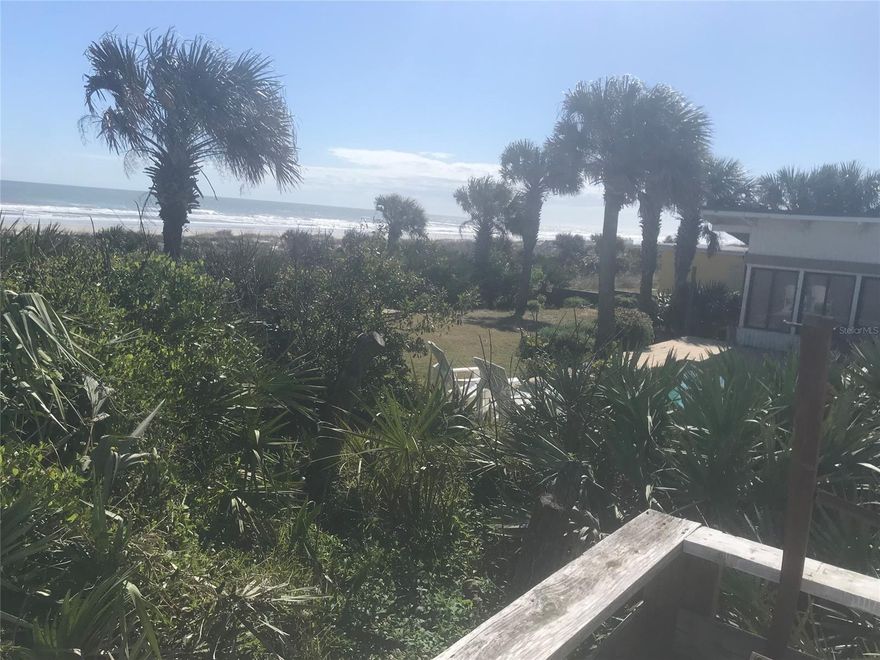 Beautiful DIRECT OCEANFRONT retreat in New Smyrna Beach, situated on one of the HIGHEST dunes in NEW Smyrna on the North end of the Beach. ;Water: City