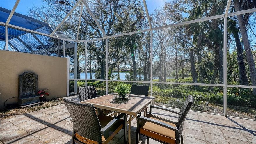 Set on one of the best and most private lots in the community, this beautifully maintained 2BR + Den villa ( LiVES LARGE LIKE A HOME) offers exceptional value, condition, and the ideal maintenance-free, lock-and-leave lifestyle. A NEW roof, impact windows, and roll-down lanai shutters provide peace of mind, privacy, and protection. Enjoy some of the community’s most captivating lake and preserve views, with daily birdwatching and tranquil natural scenery as your backdrop. The oversized southern-exposure lanai includes additional covered space if you are seeking Florida sun protection. Inside, thoughtful updates include custom interior enhancements and new flooring in the primary suite. The versatile den with a Murphy bed easily converts to a third bedroom, office, or flex space, and pocket doors in both the den and guest suite creates excellent privacy. The split floor plan is ideal for hosting visitors, and a spacious two-car garage adds valuable storage. Located in a gated community with a nearby pool and beautifully maintained grounds, this home is just 15–20 minutes to beaches, downtown Sarasota, UTC, golf, dining, and shopping. Optional memberships at Palm Aire Country Club for added amenities are always an option for lifestyle enhancement. A rare combination of privacy, condition, views, and effortless Florida living—this MOVE IN READY villa truly checks every box.