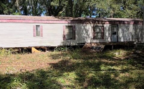 Photo of 7171 NW 166th Street, Trenton, FL 32693 (MLS # O6344990)