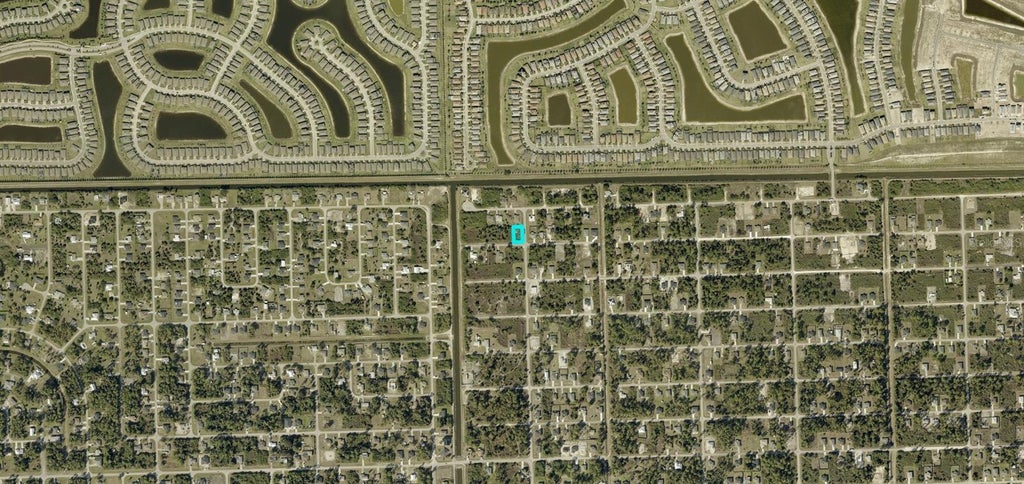 Photo of 3600 74th Street W, Lehigh Acres, FL 33971 (MLS # A4711440)