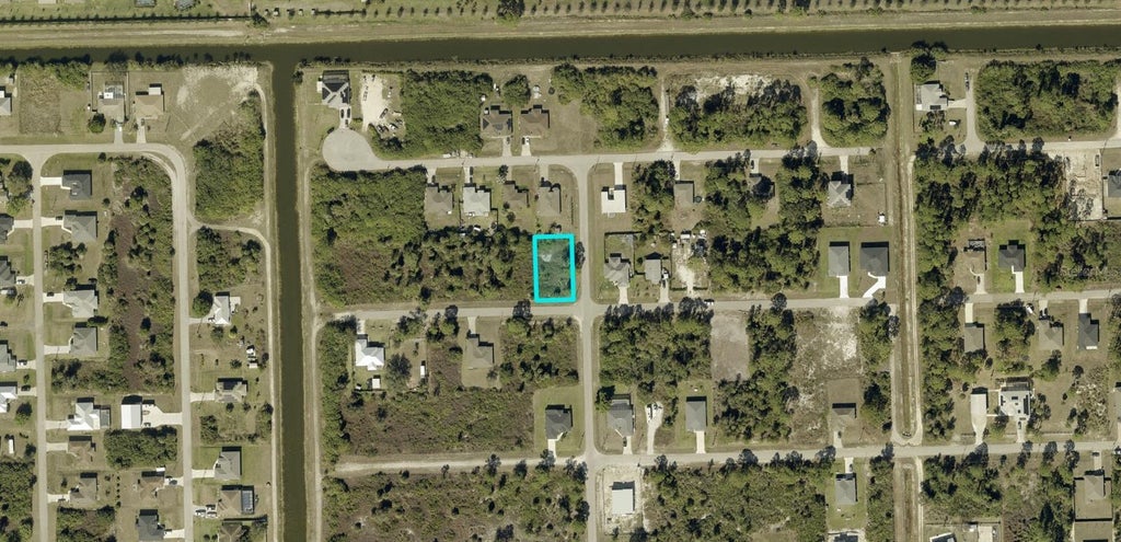 Photo of 3600 74th Street W, Lehigh Acres, FL 33971 (MLS # A4711440)