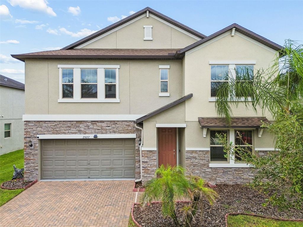 Photo of 25057 Lambrusco Loop, Lutz, FL 33559 (MLS # TB8529385)