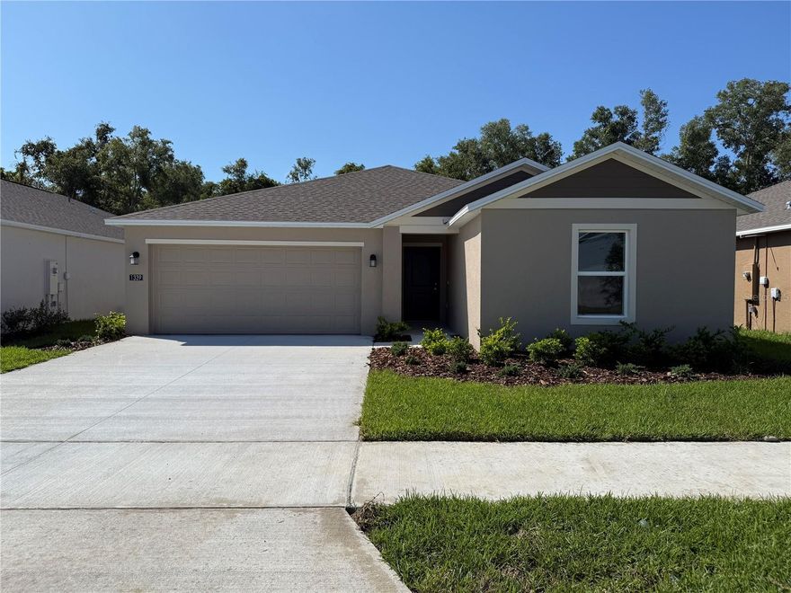 Welcome home! Be the first person to live in this stunning, newly constructed property features a functional open floor plan and thoughtful split bedroom design, including four spacious bedrooms and two full bathrooms. The gourmet kitchen features gleaming stainless steel appliances, a convenient breakfast bar, and a beautiful island providing ample space for culinary adventures and entertaining guests. Rich ceramic tile flows through the kitchen, dining room, and family room, making those high traffic spaces easy to clean, while soft plush carpet graces all bedrooms, and your feet will certainly enjoy. Outside, you can relax and enjoy Florida’s beautiful weather from the charming patio year-round. Nearby vibrant shopping centers, retail destinations, and medical facilities place daily essentials within immediate reach. Lake Beresford Park and a variety of recreation parks and trails are close by for nature enthusiasts seeking outdoor adventures. Convenient access to major roadways and I-4 ensures seamless connectivity to the surrounding areas, making this an exceptional choice for those desiring peaceful residential living combined with convenient access to essential amenities and major corridors.  Don't let this extraordinary opportunity slip away - schedule your private showing today and fall in love! Lawn service, pest control, and internet are included.