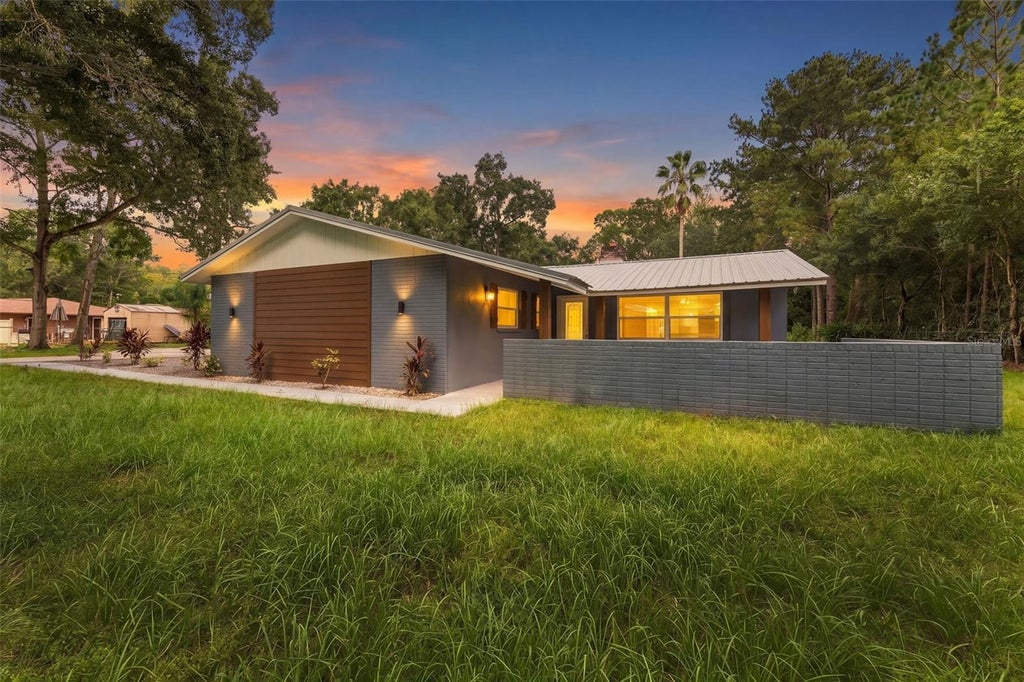 Photo of 17818 Deerfield Drive, Lutz, FL 33558 (MLS # TB8553759)