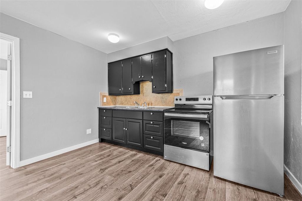 Photo of 30 Lynn Way, Madeira Beach, FL 33708 (MLS # TB8437909)