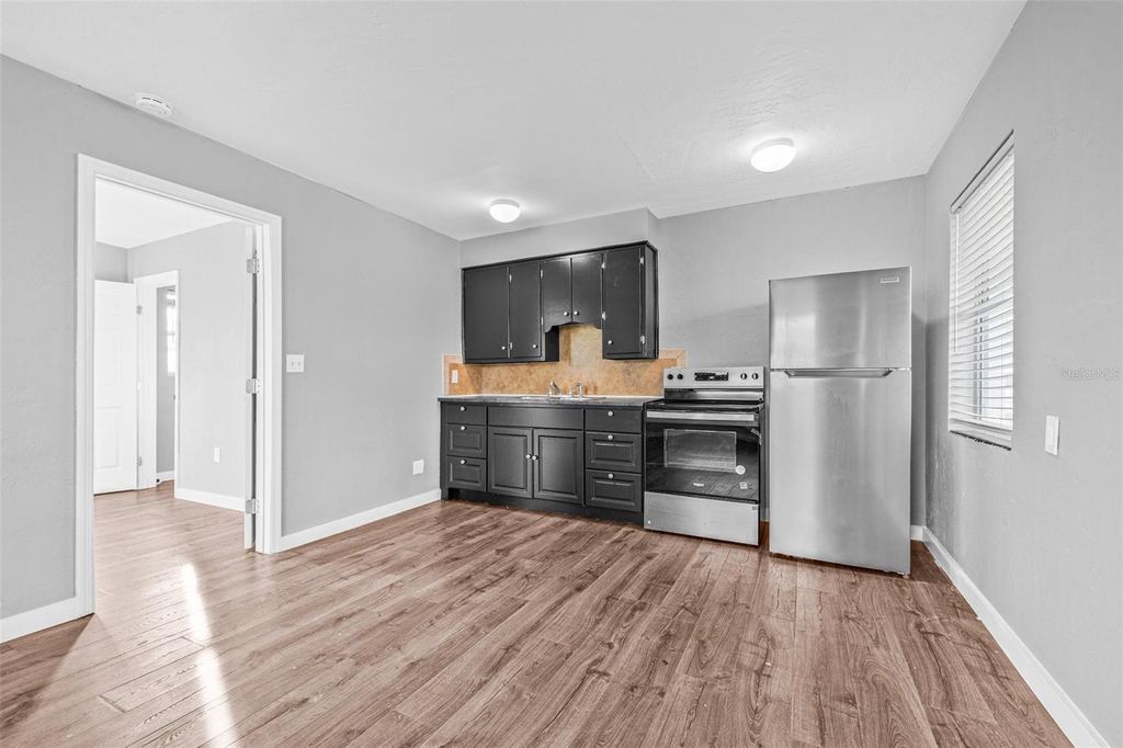 Photo of 30 Lynn Way, Madeira Beach, FL 33708 (MLS # TB8437909)