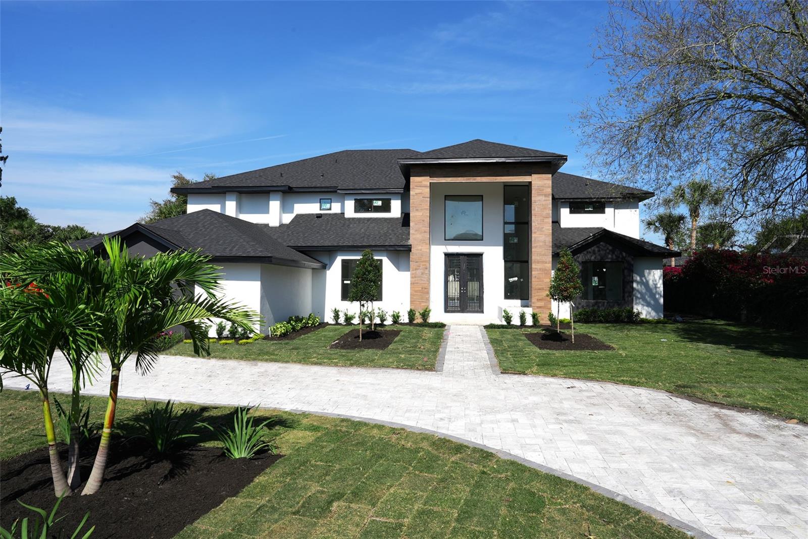 Welcome to this stunning luxury home, currently being remodeled by renowned builder Davila Construction. Located in Bay Hill Golf and Country Club, this 5 bedroom, 4 full bathroom, one half bath home offers unparalleled quality and style. As you step inside, you'll be greeted by an open and spacious living area with high ceilings and large windows that allow natural light to fill the home. The gourmet kitchen features high-end appliances, sleek countertops, and plenty of cabinet space for storage. Don't overlook the conveniently located office on the first floor! The home boasts two luxurious master suites, one on the first floor and one on the second floor, each with its own private ensuite bathroom as well as a large balcony on the second floor accessible from the master! The additional bedrooms are generously sized and perfect for hosting guests, or a growing family, as 2 of the bedrooms share a jack-and-jill bathroom, and another bedroom upstairs on suite. Step outside, and you'll find your own private oasis, complete with a sparkling pool, a summer kitchen, and a fire pit perfect for entertaining guests. Enjoy your morning coffee or evening cocktail while taking in the beautiful views of the crystal-clear pool. Bay Hill Golf and Country Club offers a variety of amenities for residents, including access to the world-renowned golf course, tennis courts, a fitness center, and a clubhouse with dining options. Don't miss your opportunity to own this exquisite luxury home in one of Orlando's most sought-after communities. Contact us today to schedule a viewing.