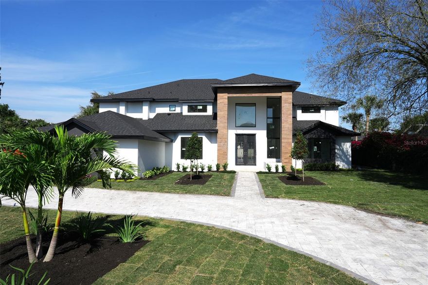 Welcome to this stunning luxury home, currently being remodeled by renowned builder Davila Construction. Located in Bay Hill Golf and Country Club, this 5 bedroom, 4 full bathroom, one half bath home offers unparalleled quality and style. As you step inside, you'll be greeted by an open and spacious living area with high ceilings and large windows that allow natural light to fill the home. The gourmet kitchen features high-end appliances, sleek countertops, and plenty of cabinet space for storage. Don't overlook the conveniently located office on the first floor! The home boasts two luxurious master suites, one on the first floor and one on the second floor, each with its own private ensuite bathroom as well as a large balcony on the second floor accessible from the master! The additional bedrooms are generously sized and perfect for hosting guests, or a growing family, as 2 of the bedrooms share a jack-and-jill bathroom, and another bedroom upstairs on suite. Step outside, and you'll find your own private oasis, complete with a sparkling pool, a summer kitchen, and a fire pit perfect for entertaining guests. Enjoy your morning coffee or evening cocktail while taking in the beautiful views of the crystal-clear pool. Bay Hill Golf and Country Club offers a variety of amenities for residents, including access to the world-renowned golf course, tennis courts, a fitness center, and a clubhouse with dining options. Don't miss your opportunity to own this exquisite luxury home in one of Orlando's most sought-after communities. Contact us today to schedule a viewing.