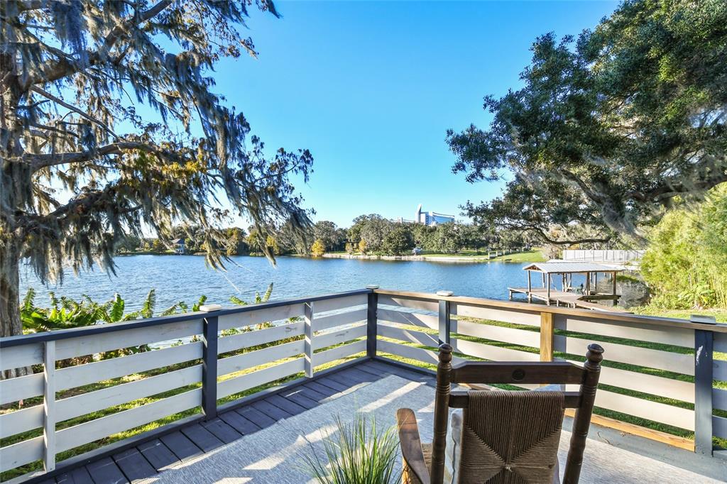 Are you looking for a lake front property with endless options? look no further! This unique home is situated on a corner lot on Lake Formosa in beautiful Orlando. Lake Formosa is a clean, deep water private lake with NO public access. This property has the only backyard boat ramp on the lake, making this a PRIVATE ski lake for the new owner. No matter what you are looking for this property will provide. Are you an investor? this home is zoned R-2A/T and there are multiple options for tenants/ leasing, and bonus! there is an almost finished private, custom studio apartment downstairs that is an additional 460sqft and includes 1 bedroom and 1 bathroom and a kitchenette. You can live upstairs (or rent long term) in this fantastic 2 bedroom 2 bath home with gorgeous lake views and airbnb the studio apartment downstairs. Or if you are looking to build your dream home, this property will provide the perfect landscape and all the lakefront fun you have dreamed of, fishing, wakeboarding, paddle boarding and kayaking. While the home feels private, you will have direct access to the urban walking trail and you are only a 5 minute drive to Downtown Orlando, Park Ave in Winter Park and Advent Hospital and walking distance to the Mennello Art Museum, the Science Center, Ivanhoe Park and lets not forget the MANY great restaurants! The lot is large and is straddled by a gorgeous live oak and an old cypress tree, you only have 1 neighbor and NO HOA. Dreams do come true, come and see it to believe it! Update 5/9/2023* Seller is in the process of finishing the studio apartment.