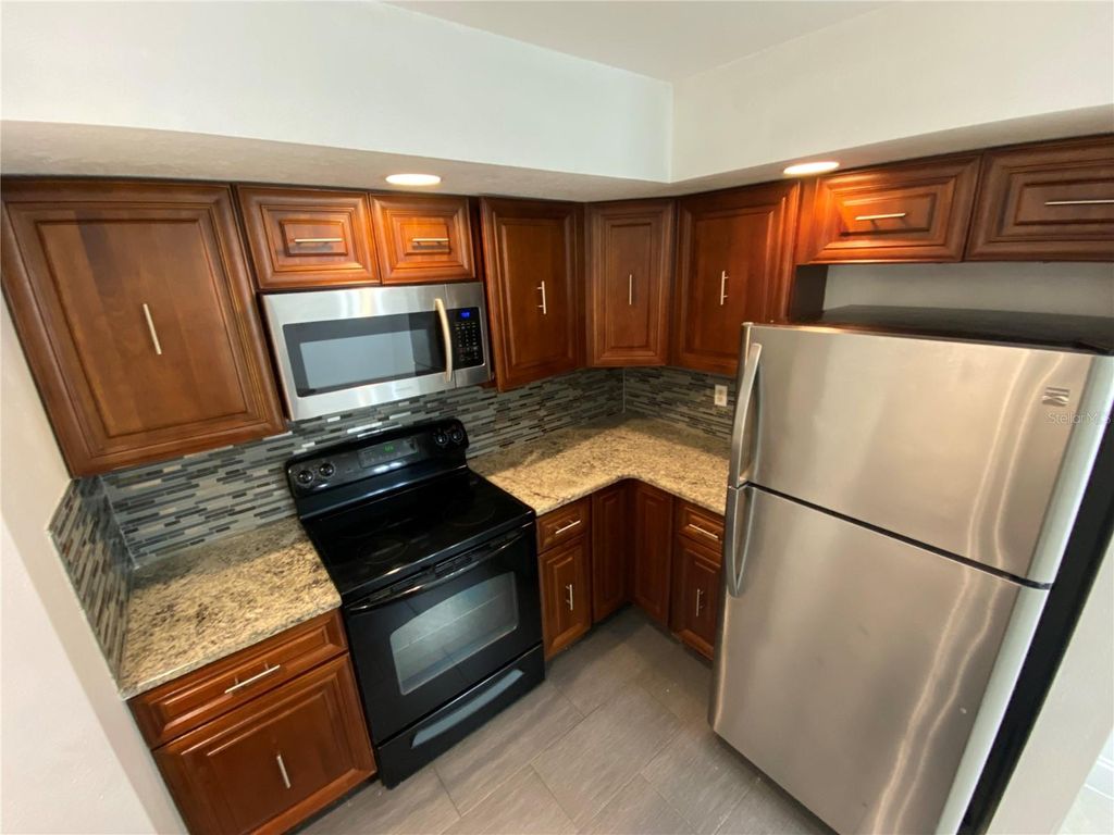 Photo of 4630 Commander Drive #1012, Orlando, FL 32822 (MLS # O6391987)