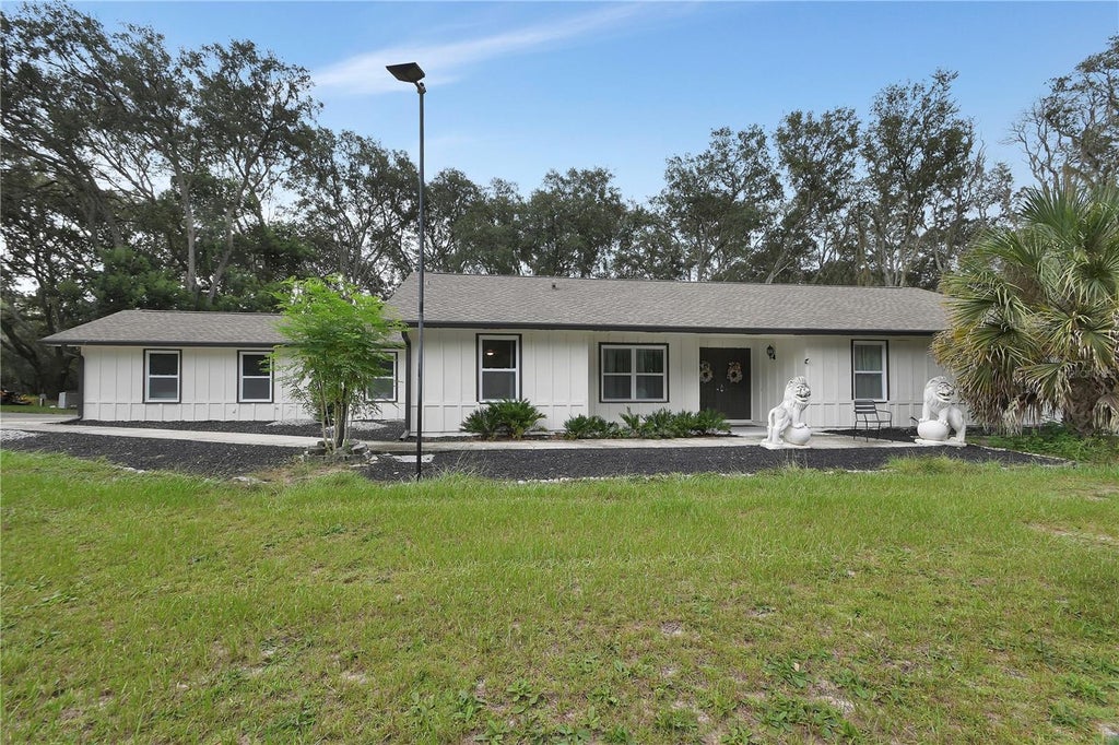 Photo of 400 Foothill Farms Road, Orange City, FL 32763 (MLS # V4951132)