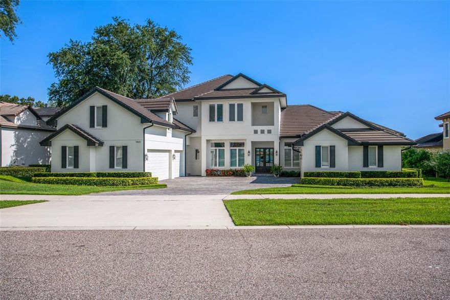 Nestled along the southern shoreline of Lake Hancock amidst an enclave of custom built lakefront homes, within the private gates of the exclusive Isles of Lake Hancock, this newly-built masterpiece offers the finest materials craftsmanship, ideally situated on 110’ of pristine shoreline frontage with the lake’s most expansive water views.  Upon entering the home, captivating pool and views highlight the spacious great room, kitchen, and family dining area. Tasteful styling and transitional elements combine worldly and contemporary details throughout. The light and bright custom kitchen includes oversized Wolf and Sun Zero appliances, a built-in Miele coffee maker and ice maker, a large island designed to accommodate dining for up to ten, and beautiful stone countertops, plus an oversized pantry. Distinctive tiling and stone of light and natural hues in all five full baths, with consistency exotic hickory wood floors in all large living areas, as well as two half baths.  The large poolside lanai features an extraordinary outdoor kitchen complete with grill, smoker, hoods and sink, a generous dining area, all enclosed by retractable screens. The entire pool deck area is surfaced by natural stone and offers stunning lake views. The custom dock and boathouse avails the best opportunities to fully enjoy Florida lake life.  Lake Hancock is a chain of three lakes, pristine waters with miles of shoreline for boating, and is paradise for fishing and all water sports.  Many top golf courses are nearby, including Disney, Orange County National, The Four Seasons, Isleworth, and West Orange.  Shopping conveniences at Hamlin are only minutes away, and the Hamlin town center plans include docks for water access to restaurants, shops and a movie theater. All only minutes from Disney, downtown Winter Garden, Windermere, and the world famous attractions of Orlando. Room Feature: Linen Closet In Bath (Bedroom 3).