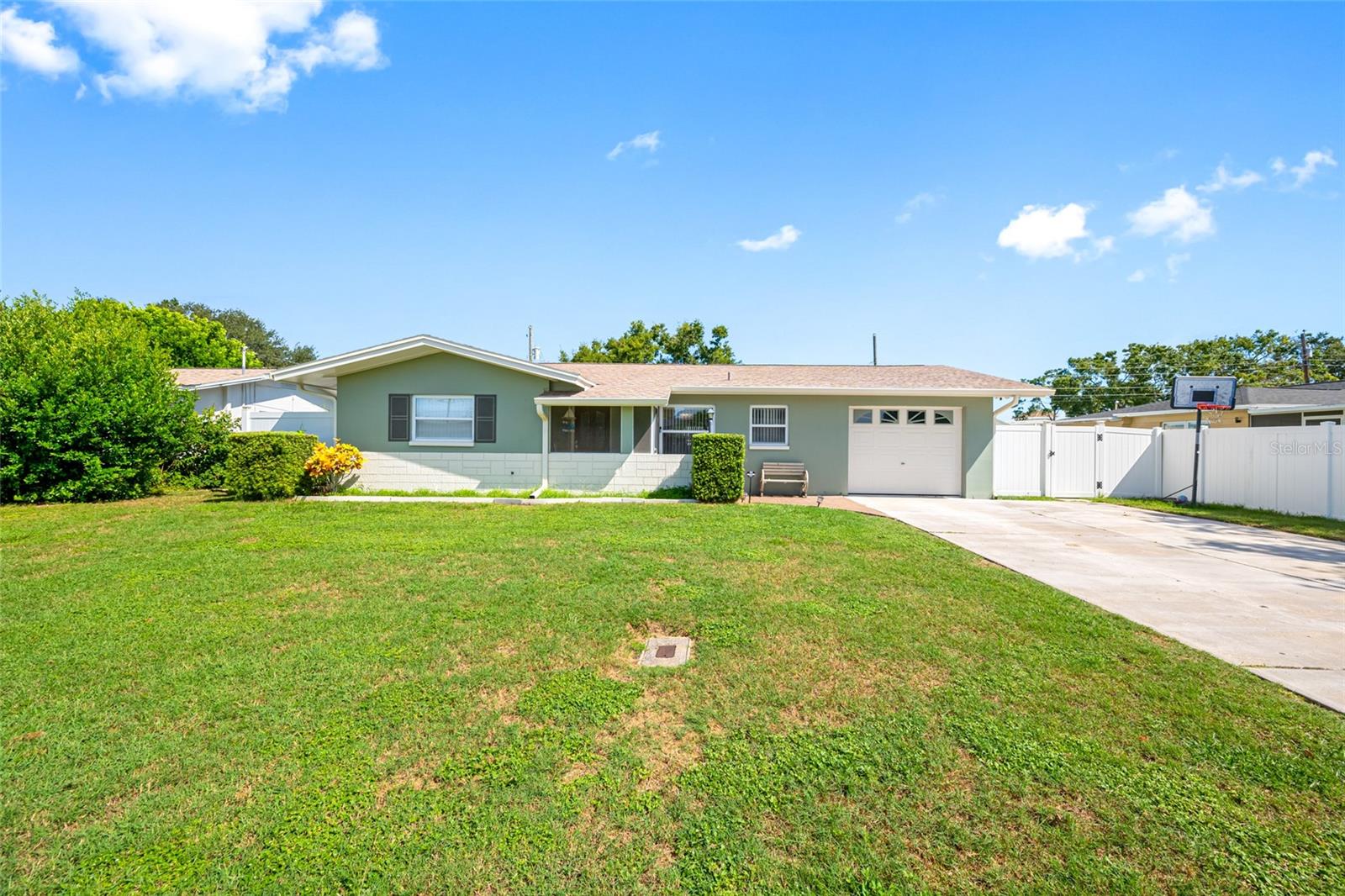Location, location, location! Only 1.3 miles from Indian Rocks Beach and in a NO FLOOD Zone! Introducing a fabulous three-bedroom, two-bathroom single-family home with an attached one-car garage and large driveway in the desirable coastal town of Largo. This residence is a true gem, offering a spacious covered & screened patio area that invites you to embrace the outdoor Florida lifestyle. The open kitchen is well maintained and spacious, now featuring NEW quartz Kitchen Countertops (2024) perfect for all your culinary needs. The master bedroom with en-suite full bath also includes a convenient laundry access door. Two comfortable secondary bedrooms share a second full bath, which has been remodeled with an energy-efficient toilet. Located less than a mile and a half away from the beach, this home provides the perfect retreat for relaxation and enjoyment with nearby beaches, shops, and restaurants. With its thoughtfully designed layout and proximity to the gulf, this property offers an unbeatable combination of comfort, convenience, and coastal charm. Recent Upgrades Include: NEW roof (in 2021) NEW HVAC (in 2020) NEW Exterior Paint (in 2022) NEW Insulation (in 2024) NEW Duct Work (in 2024) NEW Kitchen Countertops (in 2024) and Remodeled secondary bathroom with energy efficient toilet. Call today to schedule your private showing!