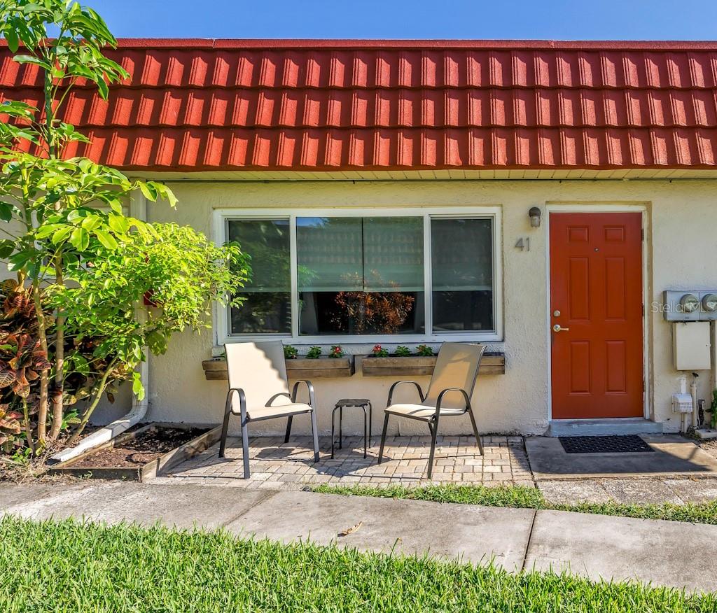 Affordable & Spacious Villa in Northwest St. Pete! Discover carefree living in this nearly 1,200 sq. ft. villa offering 2 bedrooms, 2 full baths, plus a versatile bonus room with a wall of windows—perfect for a home office, reading nook, or hobby space. Inside, you’ll find gleaming, easy-care tile and laminate floors throughout and the convenience of inside laundry. Enjoy peace of mind with newer hurricane-resistant
windows and the ease of having your covered parking space (#41) just steps from the back door. The monthly condo fee truly sets this home apart, covering water, sewer, garbage, insurance, building and grounds maintenance, and even basic cable TV and land lease fee—leaving only your electric bill! Located in a desirable Northwest St. Pete neighborhood, you’ll be just minutes from shopping, schools, restaurants, and everything the area has to offer. An incredible opportunity to own in St. Pete at a value price! Don’t miss it!