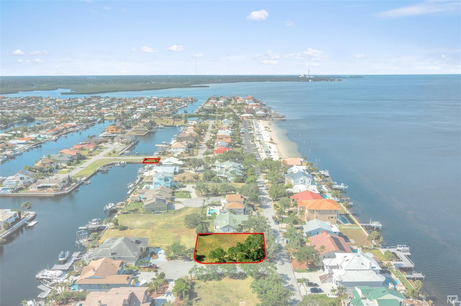 PRICE REDUCTION - Picture building your family’s dream home on this beautiful corner lot situated on a cul-de-sac block in the desirable WATERFRONT COMMUNITY of Gulf Harbors. This .27-acre property comes with your own private mooring lot on Clipper Court and has direct Gulf access just minutes away. Spectacular sunsets and walking distance from Gulf Harbors Private Beach. The HOA is optional and features a community boat ramp. Close to all amenities including schools, shopping, restaurants, medical facilities, boating, fishing, attractions, airports, and Florida's beautiful beaches. Easy commute to Tampa and Orlando. Make this great property into your dream home today!