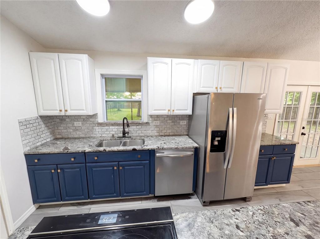 Photo of 967 Lamplighter Drive NW, Palm Bay, FL 32907 (MLS # O6399889)