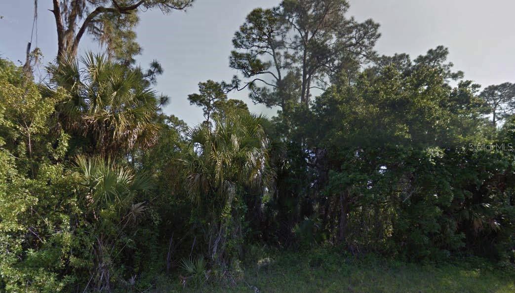 This vacant lot on Spiral Lane is located in a peaceful, developing area of North Port. Surrounded by natural Florida landscape and a mix of new and future homes, this parcel offers a great opportunity for custom home construction or long-term investment. Enjoy the privacy of a quiet street with convenient access to shopping, schools, I-75, and Gulf Coast beaches. All information is deemed reliable but should be independently verified.