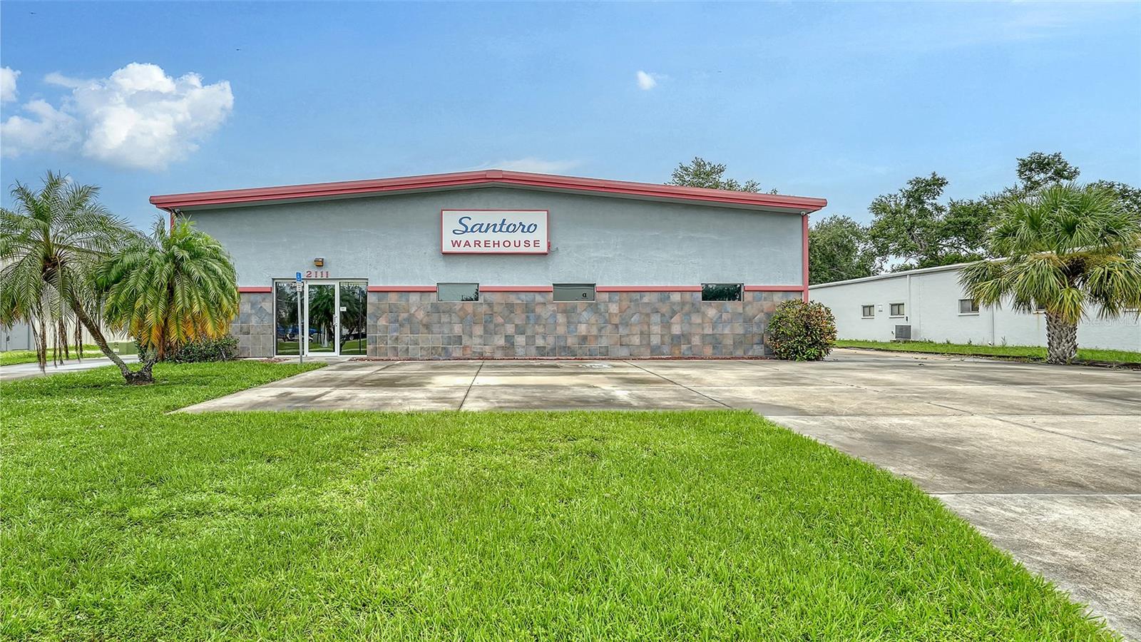 ONE OF A KIND! (CHECK OUT THE INSIDE PHOTOS!) Unusual opportunity to own a Professionally Remodeled Building that can be used as a HIGH-END GALLERY, RETAIL SALES SITE, CAR COLLECTOR'S CLUB, HOBBY ENTHUSIAST CENTER, etc. This 6,000 sq' building offers concrete flooring protected by 2 coats of color and 2 coats of clearcoat, insulated 17' ceilings, 3 - 5 ton AC units, sound-proofing foam insulation on walls & ceiling, kitchen, plus new LED LIGHTING! There are well-designed storage areas hidden behind an AMAZING FULL-SIZED DIORAMA of a town around the perimeter of the warehouse depicting shops, a bank, tavern, theater, and a reproduction of a 1950's gas station and more! Tubular skylights let the sunshine in and saves on energy costs! Create your own space for personal use, retail sales, private meeting site - use your imagination! Enjoy the convenience of electric garage door openers, security system with remote monitoring capability & motion detectors, plus new electrical service & breaker box in the warehouse! INVESTORS TAKE NOTE - the uniqueness of this building could lend itself to rental opportunities! Some items inside the warehouse are negotiable.