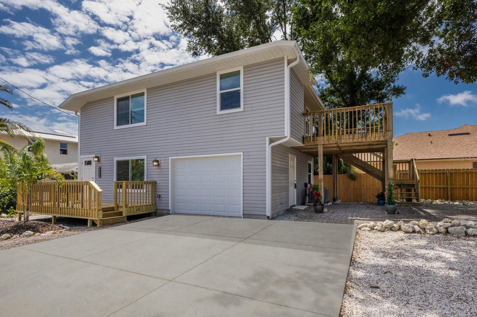 Look no further! This 3 bedroom, 2 bath home has been completely remodeled. NEW windows, NEW kitchen and baths, NEW flooring in bedrooms and baths, NEW A/C and water heater, NEW fencing and more. Located in a convenient location in central Sarasota. NO HOA. Just 4.5 miles to SIESTA KEY, 9.5 miles to SRQ International Airport and minutes away from dining, shopping and more! The third bedroom leads out onto a spacious balcony and can also be used as an office, den or flex space. With a large, fenced in yard you will enjoy privacy while being close to town. You will not want to miss this "like new" home~
Call today to schedule a private showing or for more information!